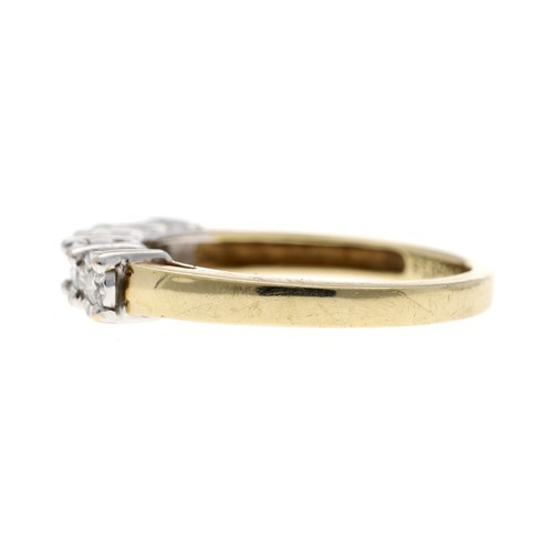 220 - 9ct yellow gold five stone diamond ring in an illusion setting, 0.15ct, width 3.5mm, 2.7gm, ring siz... 