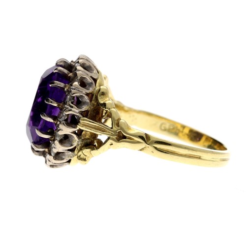 222 - 18ct yellow gold oval amethyst and diamond cluster ring with pierced stylised shoulder, 16mm x 13mm,... 