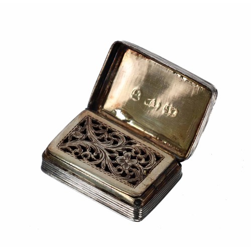 525 - George IV silver vinaigrette, the engraved hinged top enclosing a gilt interior with a pierced grill... 