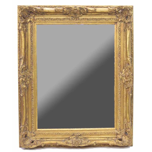 823 - Impressive large ornate gilt framed mirror, with bevelled glass in a shell and scroll frame, 44