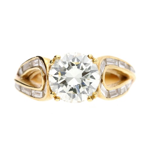 292 - Good 18ct yellow gold solitaire brilliant-cut diamond set ring, with the openwork shoulders set with... 