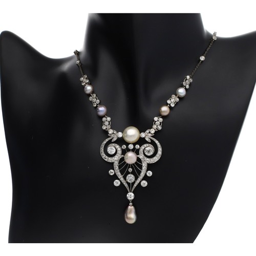 305 - Fine antique white metal diamond and pearl drop necklace, set with old-cut diamonds in a scroll open... 