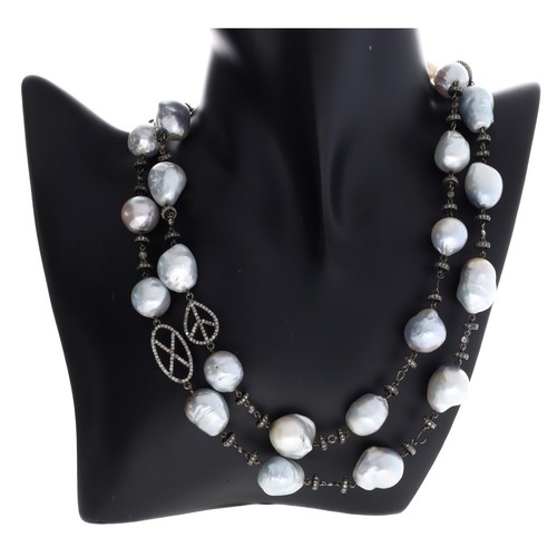 280 - Attractive baroque pearl and diamond set necklace, 103.3gm, 35