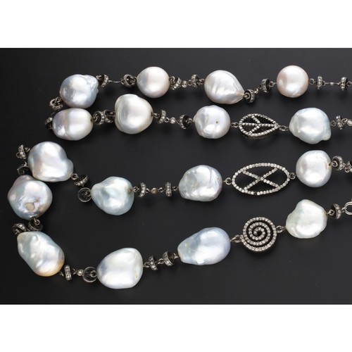 280 - Attractive baroque pearl and diamond set necklace, 103.3gm, 35