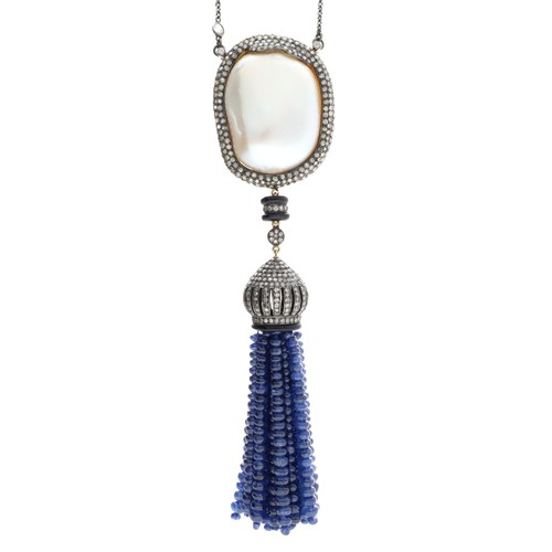 281 - Attractive sapphire bead, onyx and baroque pearl pendant on necklace, 65.7gm, 28