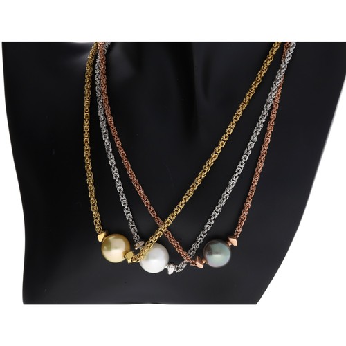 274 - Set of three 18ct yellow, white and rose gold pearl set necklaces, the pearls each14mm, 46.7gm total... 