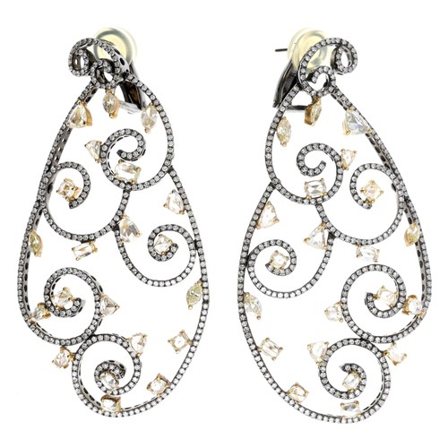 272 - Pair of large multi-shaped diamond set earrings, with a scroll openwork design, clip post backs, 27g... 