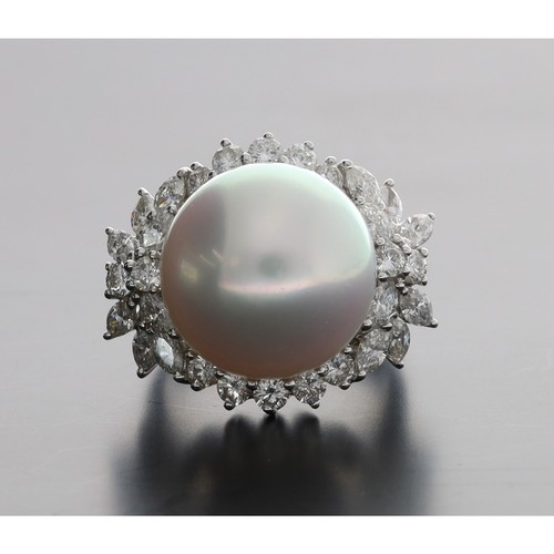 328 - Impressive 18ct white gold cultured pearl and diamond set dress ring, the pearl 16mm in a fine diamo... 