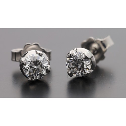 267 - Pair of 18ct white gold diamond stud earrings, round brilliant-cuts, each 0.25ct approx, post and bu... 