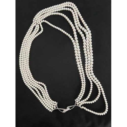 310 - Fine Utopia five strand South Sea pearl necklace with an 18ct white gold diamond clasp, 383.5gm, the... 