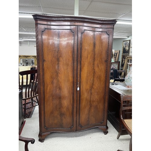 782 - 19th century French mahogany bow-fronted wardrobe, the carved key cornice over two long shaped panel... 