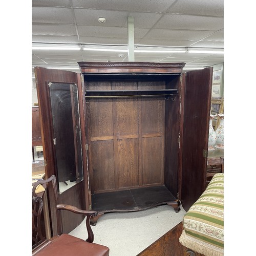 782 - 19th century French mahogany bow-fronted wardrobe, the carved key cornice over two long shaped panel... 