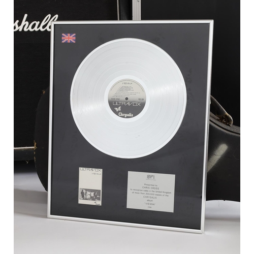 79 - Chris Cross (Ultravox) - official BPI Certified Sales Award platinum disc presented to Chris Cross t... 