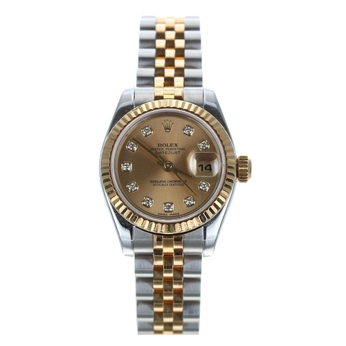 561 - Rolex Oyster Perpetual Datejust gold and stainless steel lady's wristwatch, reference no. 179173, se... 