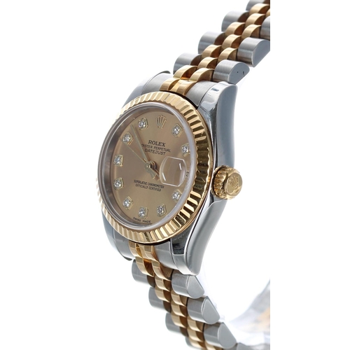 561 - Rolex Oyster Perpetual Datejust gold and stainless steel lady's wristwatch, reference no. 179173, se... 