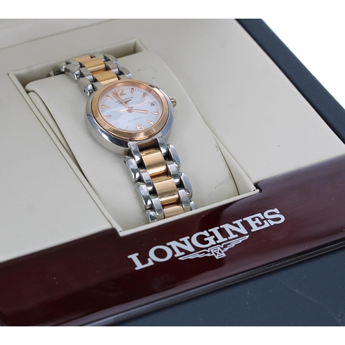 607 - Longines Primaluna automatic 18ct rose gold and stainless steel lady's wristwatch, reference no. L8.... 