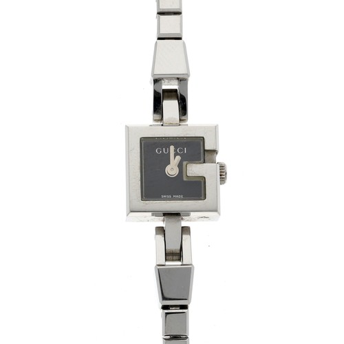 710 - Gucci G Mini square stainless steel lady's wristwatch, reference no. 102, square black dial, Gucci b... 