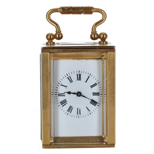 1203 - Small travelling carriage clock timepiece within a plain gilded brass case, 3.5