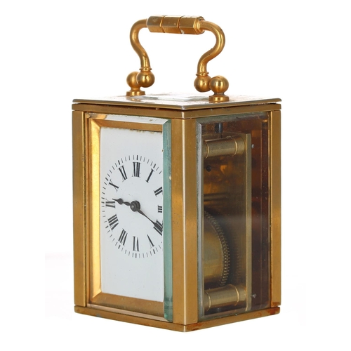 1203 - Small travelling carriage clock timepiece within a plain gilded brass case, 3.5