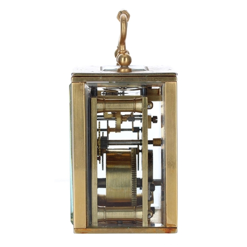 1203 - Small travelling carriage clock timepiece within a plain gilded brass case, 3.5