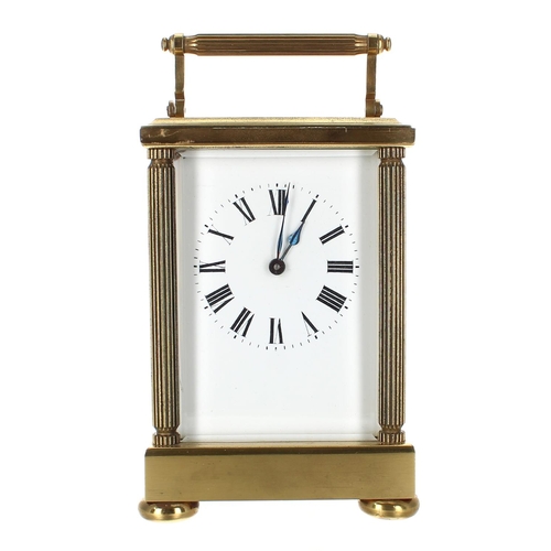 1219 - Large carriage clock timepiece within a fluted pillared brass case, 7