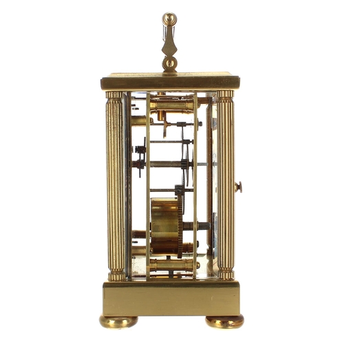 1219 - Large carriage clock timepiece within a fluted pillared brass case, 7