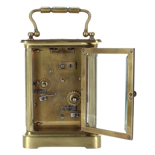 1220 - Small carriage clock timepiece with alarm, within a corniche brass case, 8.75