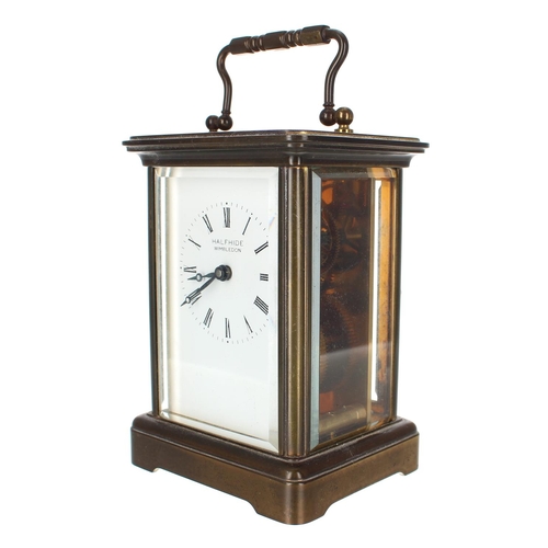 1222 - Carriage clock timepiece, stamped Swiss Made beneath the base and the dial inscribed Halfhide, Wimbl... 