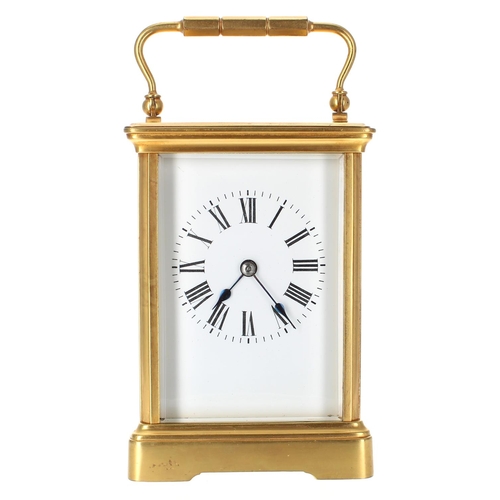 1242 - Carriage clock striking on a gong, within a gilded corniche brass case, 7