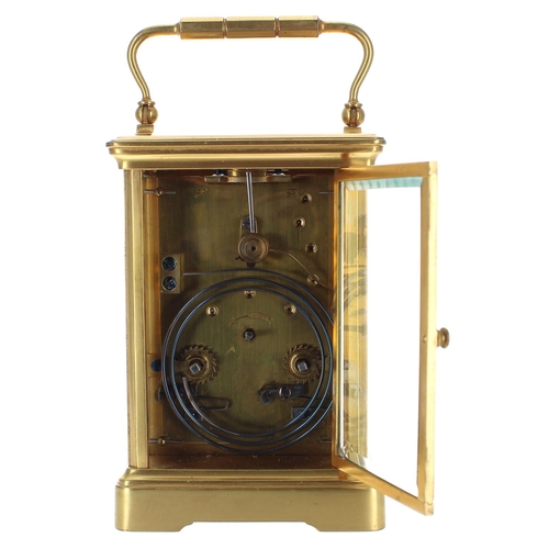 1242 - Carriage clock striking on a gong, within a gilded corniche brass case, 7