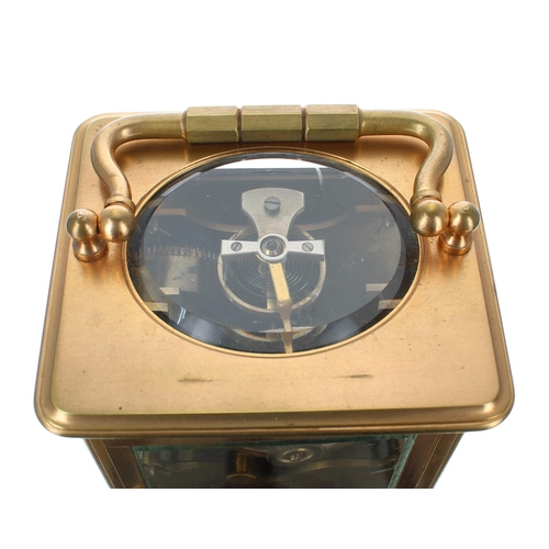 1244 - Reproduction carriage clock with alarm striking on a bell, the white dial with centre seconds signed... 