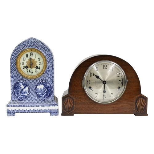 2311 - French pottery two train lancet mantel clock, the Japy Freres movement striking on a bell, with... 