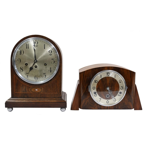 2317 - Junghans oak three train mantel clock striking on four rods, within a rounded arched case, 13.5