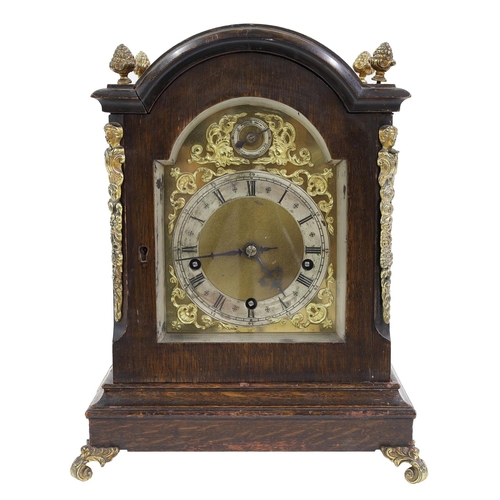 2322 - German oak three train bracket clock, the W & H movement playing on four gongs and striking the ... 