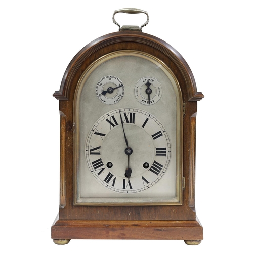 2329 - Mahogany three train mantel clock striking on five copper rods, the 7