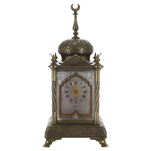 1302 - Attractive small brass two train mantel clock striking on a gong and probably made for the Turkish m... 