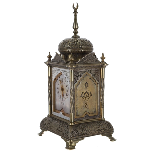 1302 - Attractive small brass two train mantel clock striking on a gong and probably made for the Turkish m... 