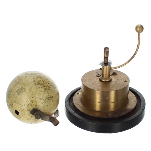 2508 - Small globe clock, with horizontal day/night twenty-four hour disc over a cylindrical base housing t... 