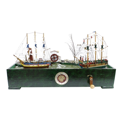 1344 - Good scratch built automata featuring two rocking ships, a castle with marching soldiers and two mil... 