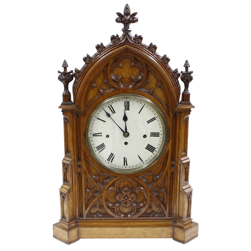 1325 - Gothic oak triple fusee boardroom clock, the movement playing on a nest of eight bells and striking ... 