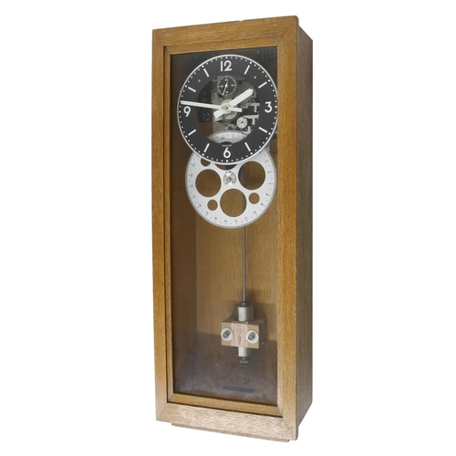 1110 - Inducta electric master wall clock, the 8.25