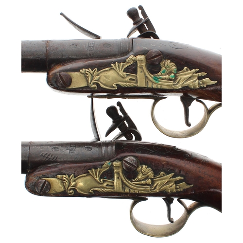 1099 - Pair of 18th century flintlock overcoat pistols signed J. Harding, 4.25