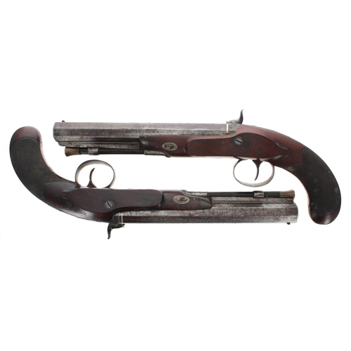 1111 - Good pair of percussion duelling pistols signed Williamson, .650 calibre, walnut half stocks, engrav... 