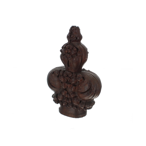 911 - Carved oak pew end poppy-head finial, 11.5