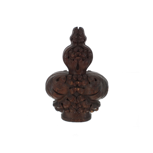 911 - Carved oak pew end poppy-head finial, 11.5