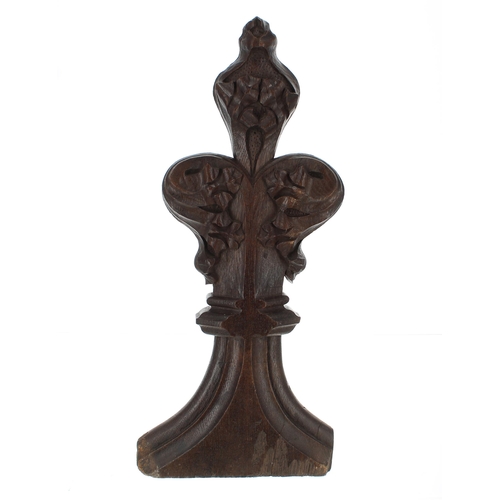 912 - Carved oak pew end poppy-head finial, 18