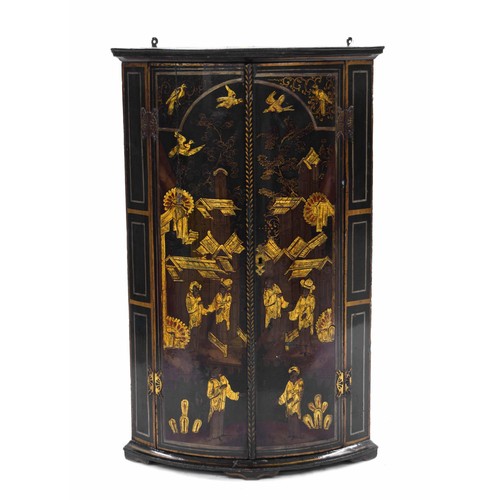 951 - Georgian chinoiserie bow-front hanging corner cupboard, the twin hinged doors with figural landscape... 