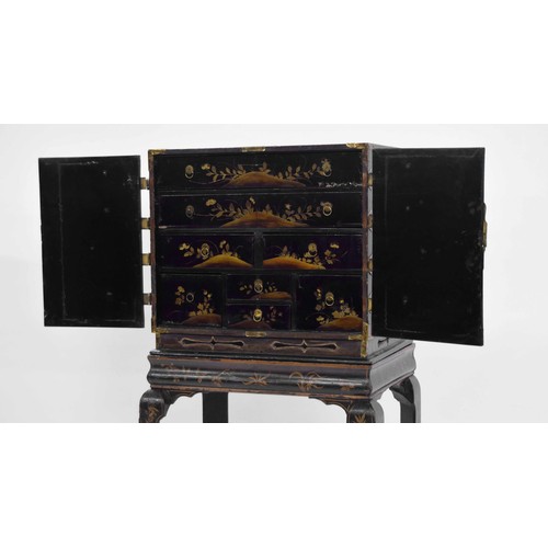 959 - 19th century Chinese lacquer and brass mounted cabinet on stand, the decorated cabinet with two door... 