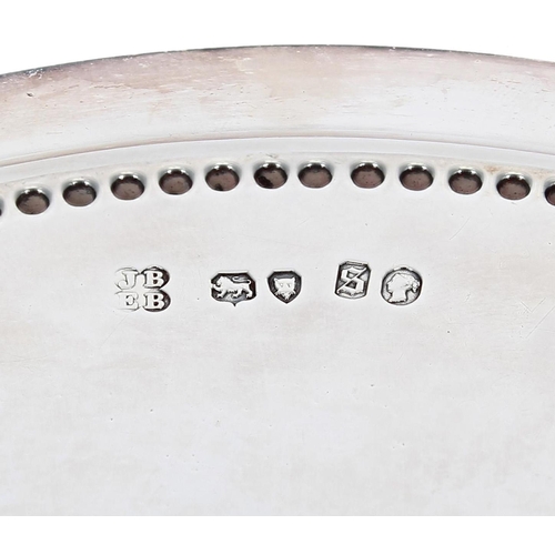 565 - Victorian engraved circular silver card tray, with repeated border decorations around a central pres... 