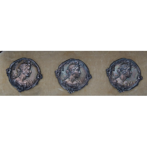 568 - Set of six Art Nouveau silver buttons, each cast in low relief with side profiles of a maiden in a f... 